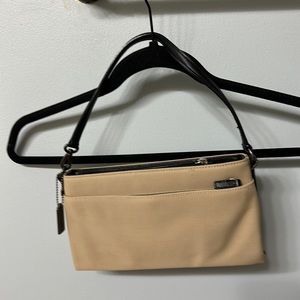 Coach small canvas clutch